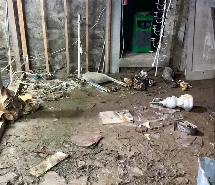 Mud and water in the basement of a Kennewick, WA home